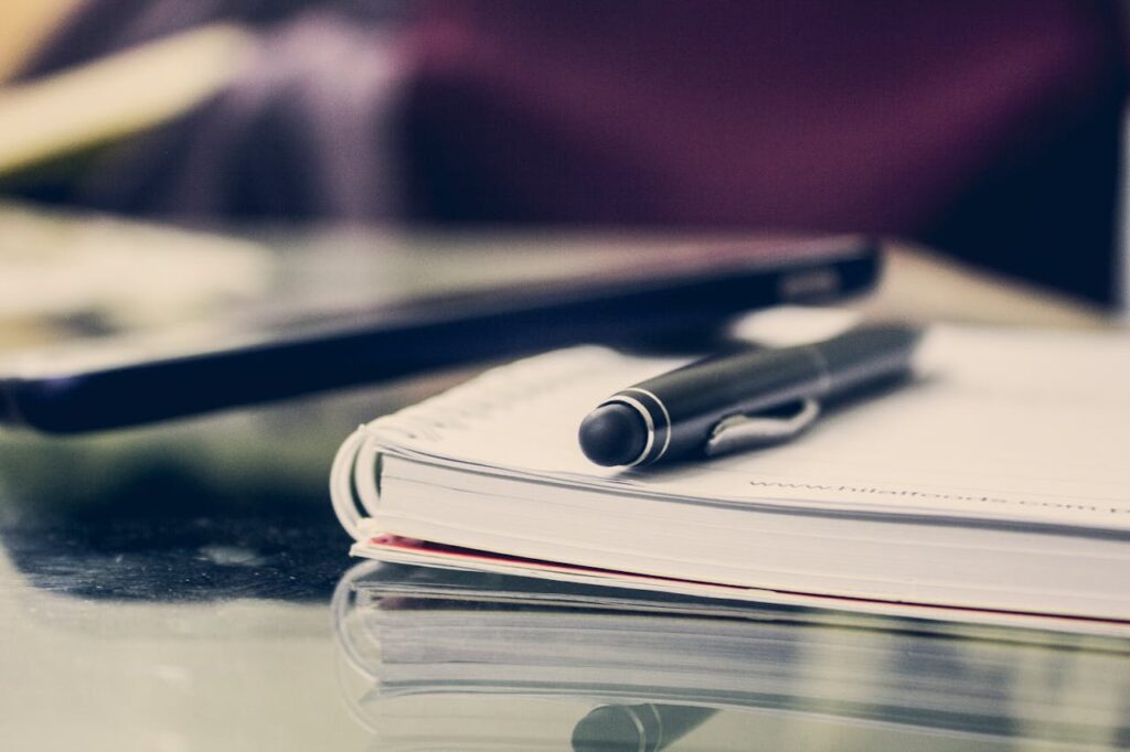 Notebook and pen on a table