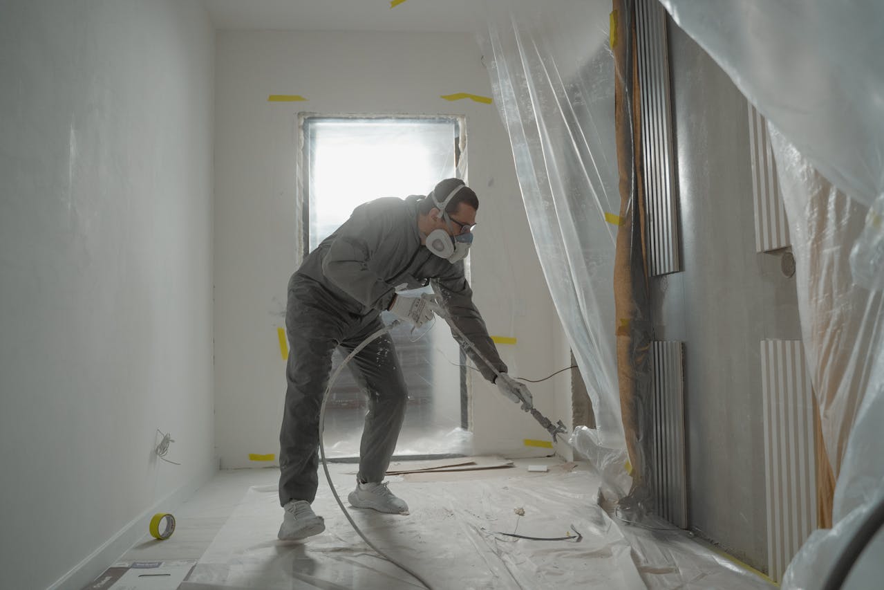 Worker renovating the interior of a rental unit