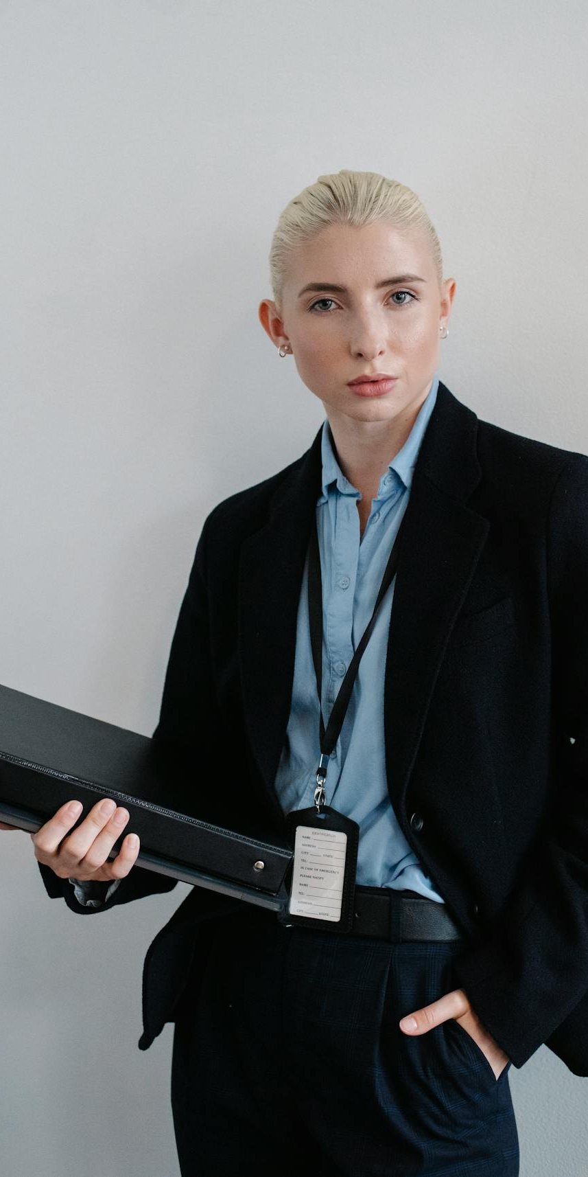 Real Estate Professional Professional woman holding a binder